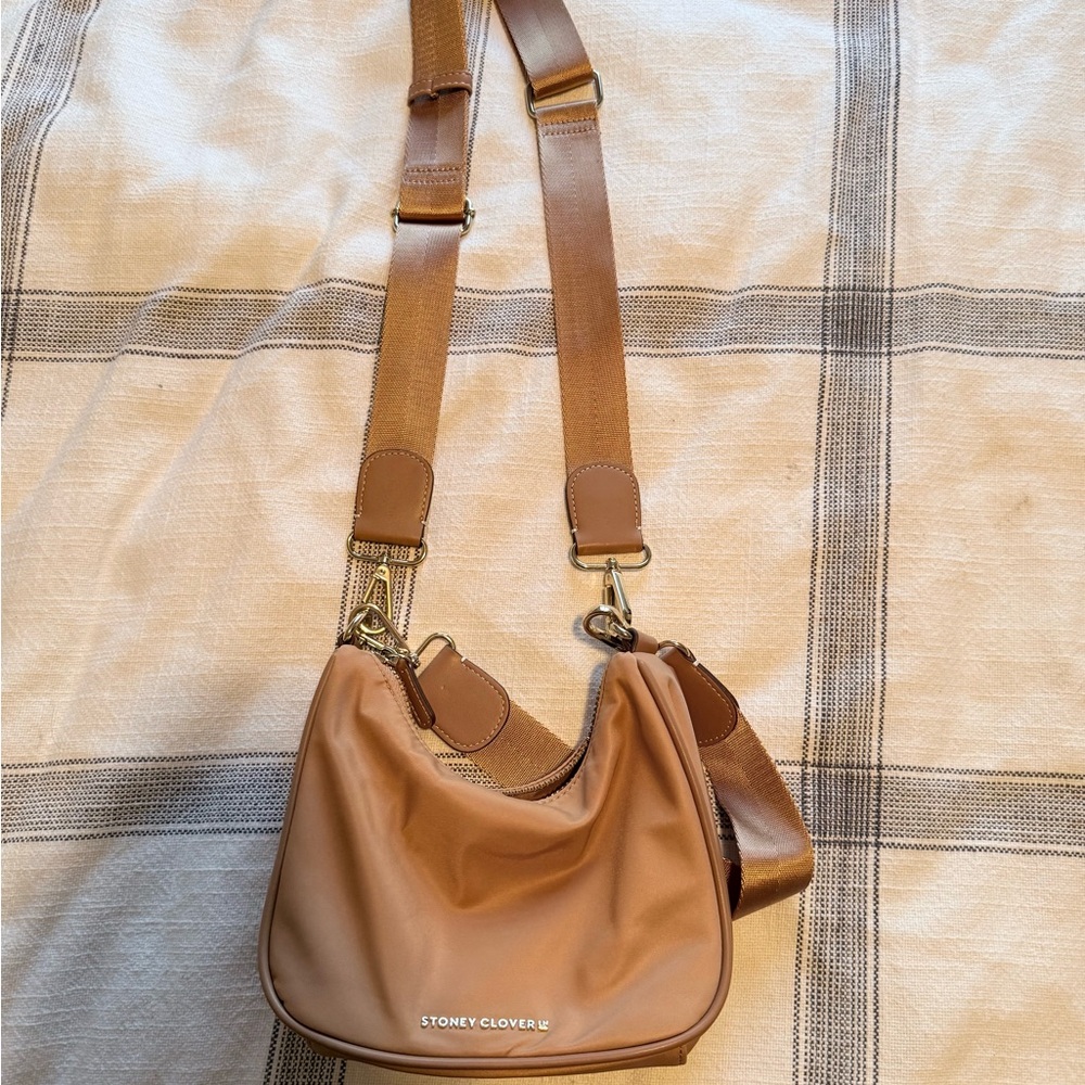 SOLD Stoney Clover Lane curved tan hobo bag